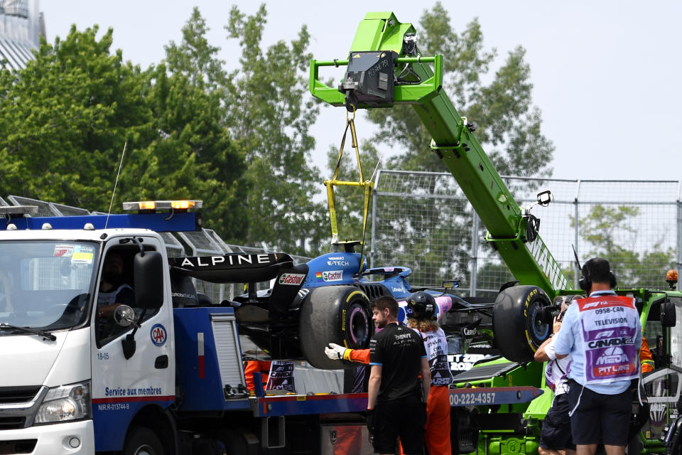 MONTREAL, QUEBEC - JUNE 16: The car of Pierre Gasly of France and Alpine F1 is recovered from the garage after coming to a stop on the track during practice ahead of the F1 Grand Prix of Canada at Circuit Gilles Villeneuve on June 16, 2023 in Montreal, Quebec.  (Photo by Rudy Carezzevoli/Getty Images)