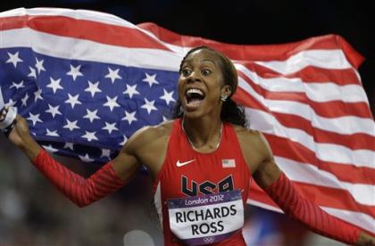 USA's Sanya Richards-Ross reacts after winning the women's 400-meter during the athletics in the Olympic Stadium at the 2012 Summer Olympics, London, Sunday, Aug. 5, 2012. (AP Photo/Markus Schreiber)