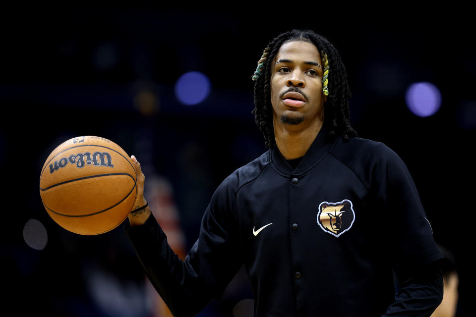 NEW ORLEANS, LOUISIANA - NOVEMBER 15: Ja Morant #12 of the Memphis Grizzlies warms up prior to the start of an NBA game at Smoothie King Center on November 15, 2022 in New Orleans, Louisiana. NOTE TO USER: User expressly acknowledges and agrees that, by downloading and or using this photograph, User is consenting to the terms and conditions of the Getty Images License Agreement. (Photo by Sean Gardner/Getty Images)