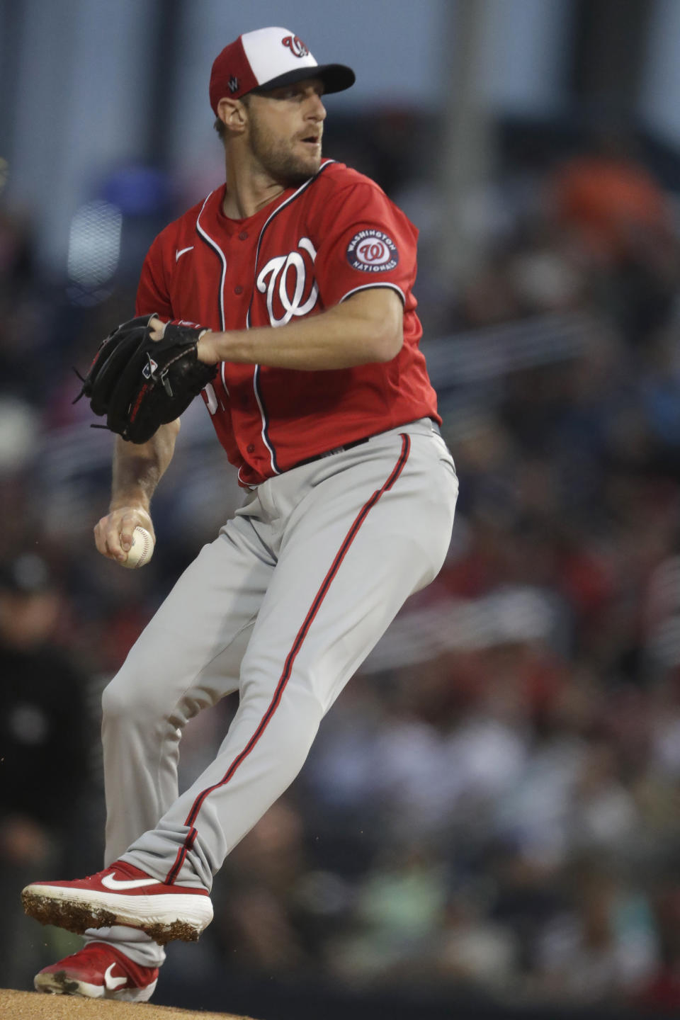 Washington Nationals starting pitcher Max Scherzer (31) works in the first inning of a spring training baseball game against the Houston Astros Saturday, Feb. 22, 2020, in West Palm Beach, Fla. (AP Photo/John Bazemore)