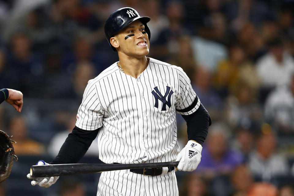 Aug 15, 2019; Bronx, NY, USA; New York Yankees right fielder Aaron Judge (99) reacts to striking out against the Cleveland Indians during the fifth inning at Yankee Stadium. Mandatory Credit: Adam Hunger-USA TODAY Sports