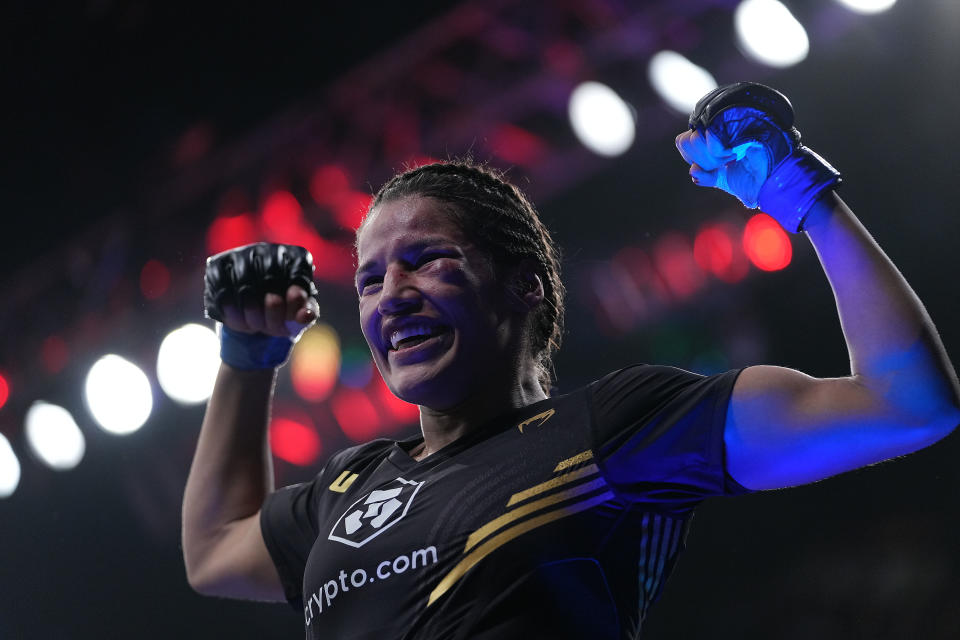 Dec 11, 2021; Las Vegas, Nevada, USA; Julianna Pena celebrates her victory by submission against Amanda Nunes during UFC 269 at T-Mobile Arena. Mandatory Credit: Stephen R. Sylvanie-USA TODAY Sports