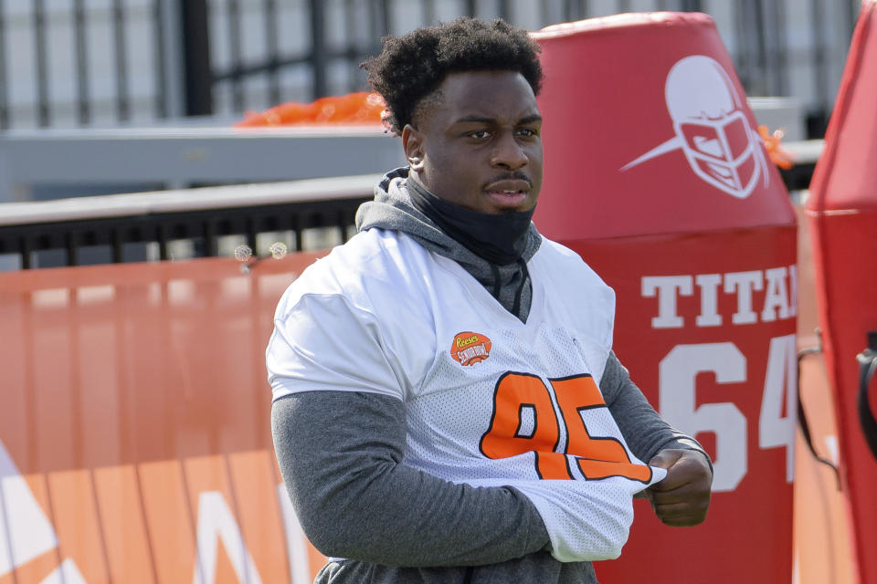 Washington defensive lineman Levi Onwuzurike might fit right in with Dan Campbell's Detroit Lions. (AP Photo/Matthew Hinton)