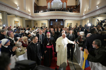 Pope Francis is seen during a meeting with representatives of other Christian denominations at Saint Peter's Cathedral in Rabat, Morocco, March 31, 2019. Vatican Media/­Handout via REUTERS