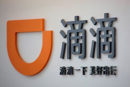 The logo of Didi Chuxing is seen at its headquarters in Beijing, China, May 18, 2016. REUTERS/Kim Kyung-Hoon
