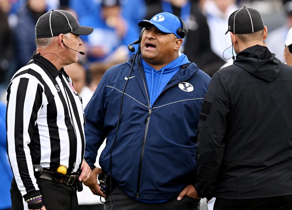 Brigham Young Cougars head coach Kalani Sitake talks with an official as BYU and Oklahoma play at LaVell Edwards Stadium in Provo on Saturday, Nov. 18, 2023. OU won 31-24. | Scott G Winterton, Deseret News