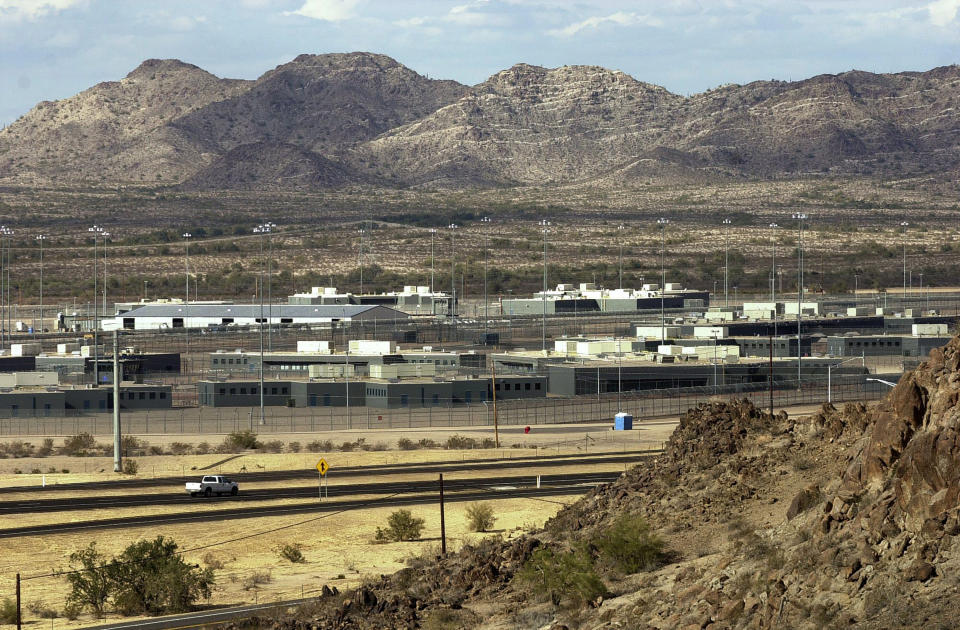 FILE - This Jan. 20, 2004, photo shows the Arizona State Prison Complex-Lewis in Buckeye, Arizona. A new report says locks failed for years at an Arizona prison and allowed for serious beatings of prisoners and guards, but Department of Corrections Director Charles Ryan failed to appreciate the seriousness of the problem until video of an assault was broadcast on television. (AP Photo/Tom Hood, File)