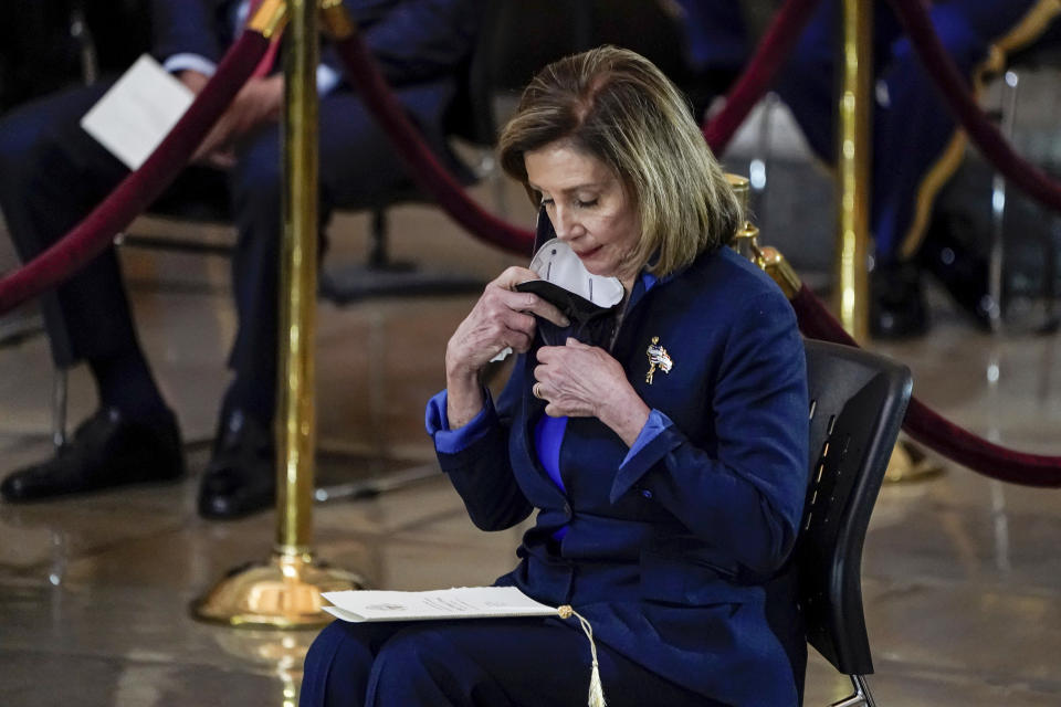 House Speaker Nancy Pelosi of Calif., attends a ceremony to honor slain U.S. Capitol Police officer William "Billy" Evans as he lies in honor at the Capitol in Washington, Tuesday, April 13, 2021. (Amr Alfiky/The New York Times via AP, Pool)