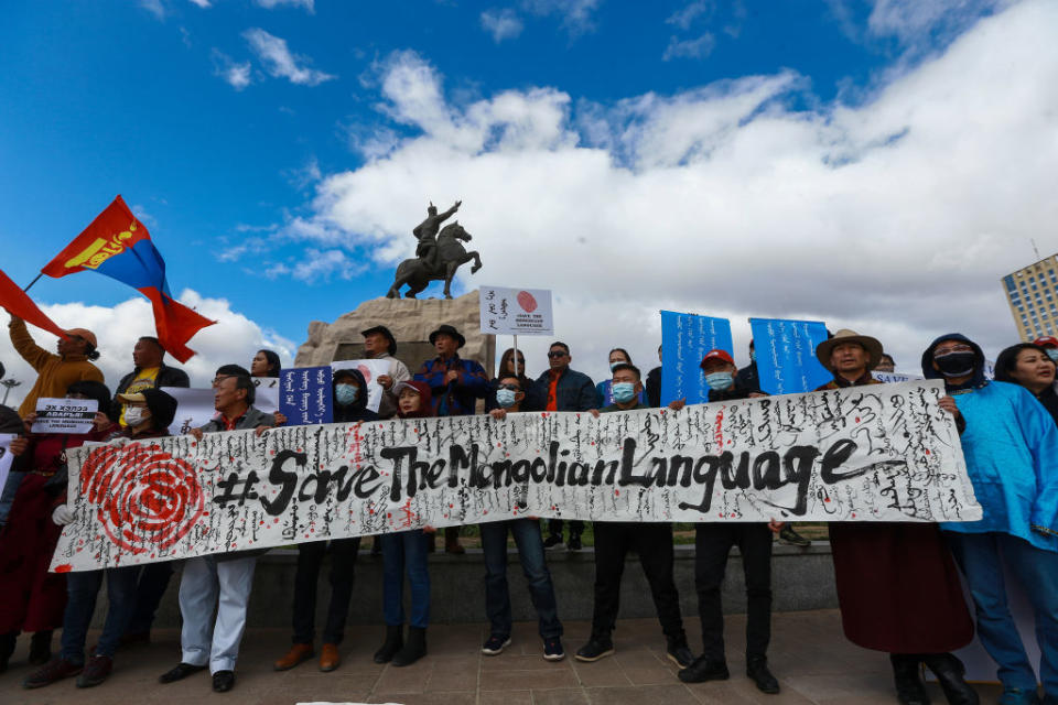 Mongolians protest against China's plan to introduce Mandarin-only classes at schools in the Chinese province of Inner Mongolia, at Sukhbaatar Square in Ulaanbaatar, the capital of Mongolia on September 15, 2020. -<span class="copyright">BYAMBASUREN BYAMBA-OCHIR/AFP via Getty Images</span>