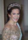 <p>Nothing says “princess” like a ruby-and-diamond-encrusted tiara, especially one that dates back two centuries. According to royal gem-watching blog, <a href="http://www.thecourtjeweller.com/2016/08/the-danish-ruby-parure-tiara.html" rel="nofollow noopener" target="_blank" data-ylk="slk:The Court Jeweller;elm:context_link;itc:0" class="link ">The Court Jeweller</a>, the gems were first worn by a royal lady close to Napoleon. The jewels made several passes through a few different countries via royal weddings, eventually ending up in Denmark. Wearing the tiara is a nod to the long tradition that connects generations of European royalty. </p>