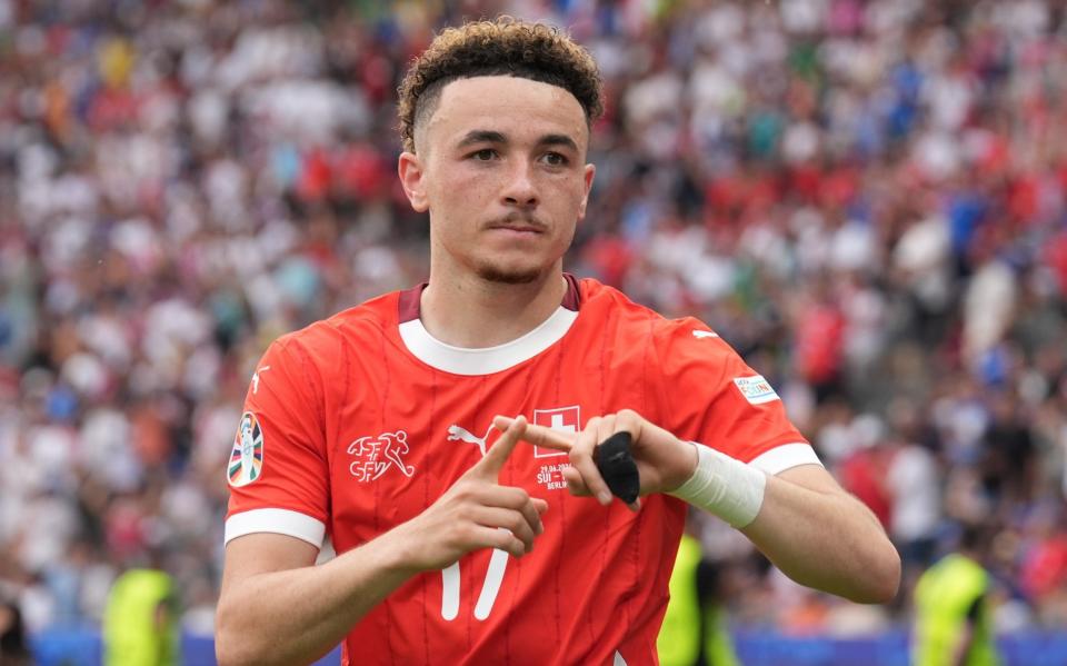 Ruben Vargas celebrates after putting Switzerland 2-0 ahead.