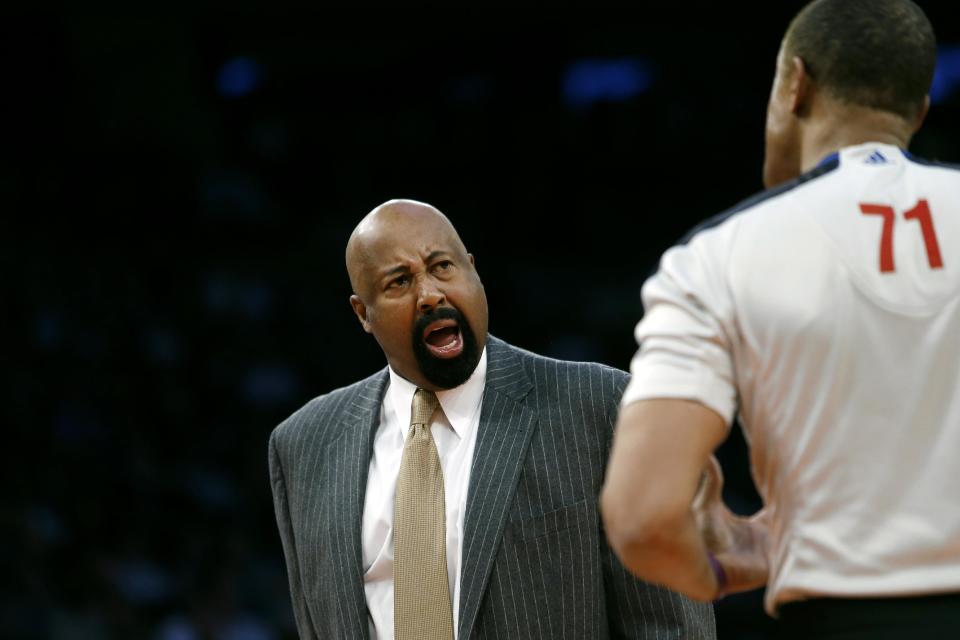 New York Knicks coach Mike Woodson argues with an official during the second half of an NBA basketball game against the Dallas Mavericks, Monday, Feb. 24, 2014, in New York. Dallas won 110-108. (AP Photo/Jason DeCrow)