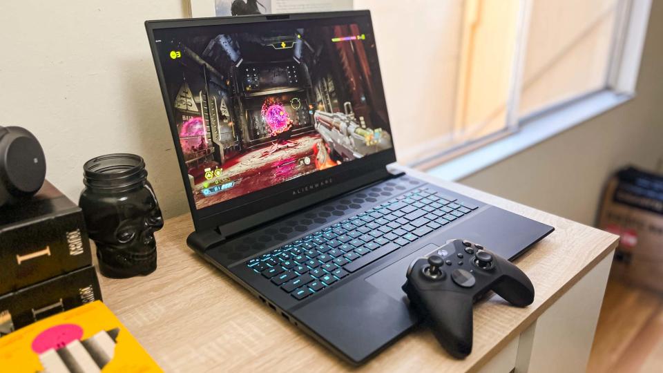 Alienware m18 review unit on desk running Doom Eternal