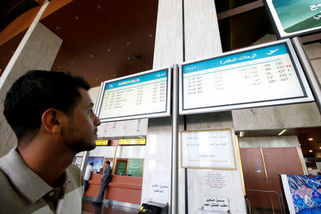 A man looks at a flight information board at Basra airport after it was targeted by rocket fire in Basra, Iraq September 8, 2018. REUTERS/Essam al-Sudani