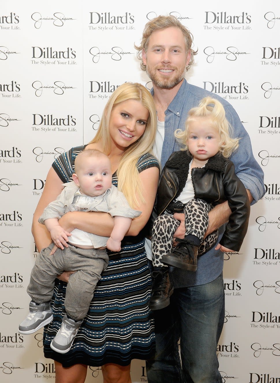 Ace Johnson, Jessica Simpson, Eric Johnson and Maxwell Johnson attend a Jessica Simpson Collection event at Dillard's on November 23, 2013 in Dallas, Texas. 