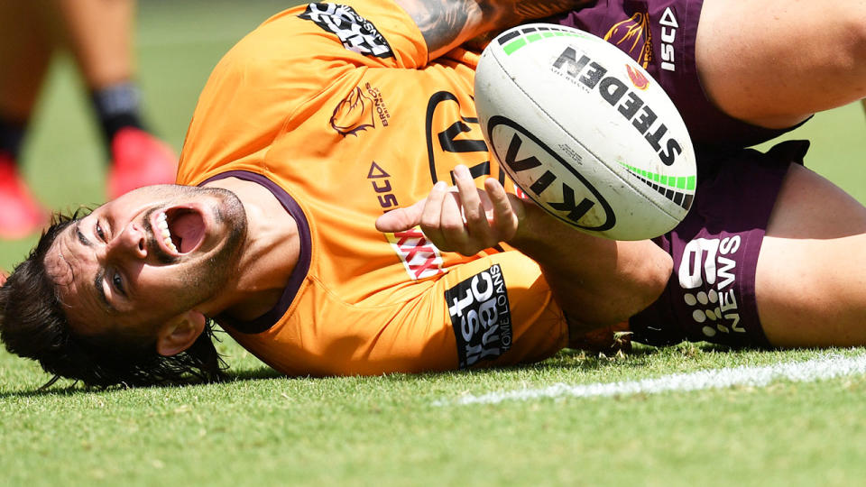 Seen here, Jack Bird lies in agony after injuring his knee at Broncos training.