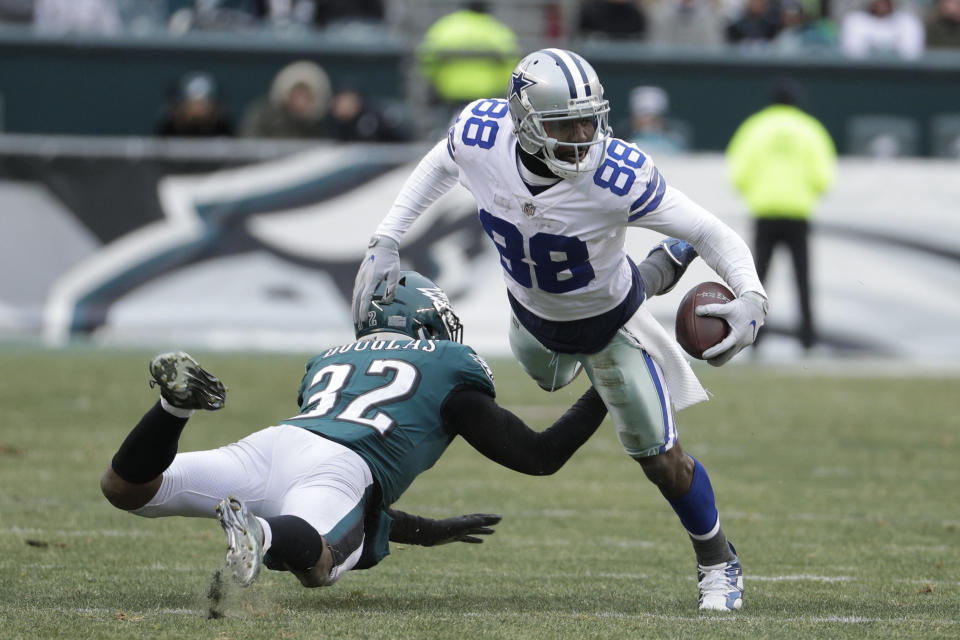 Dallas Cowboys' Dez Bryant, right, is tackled by Philadelphia Eagles' Rasul Douglas during the second half of an NFL football game, Sunday, Dec. 31, 2017, in Philadelphia. (AP Photo/Chris Szagola)