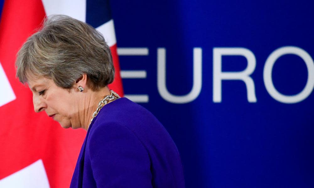 Theresa May leaves after a news conference at the EU leaders’ summit in Brussels on Thursday