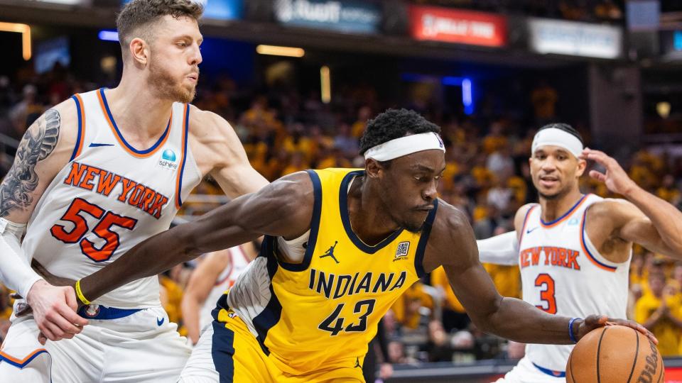May 10, 2024; Indianapolis, Indiana, USA; Indiana Pacers forward Pascal Siakam (43) dribbles the ball while New York Knicks center Isaiah Hartenstein (55) defends during game three of the second round for the 2024 NBA playoffs at Gainbridge Fieldhouse.