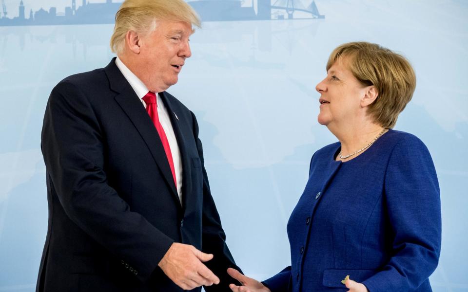 German Chancellor Angela Merkel meets U.S. President Donald Trump on Thursday at the G20 summit in Hamburg - Credit: REUTERS/Michael Kappeler