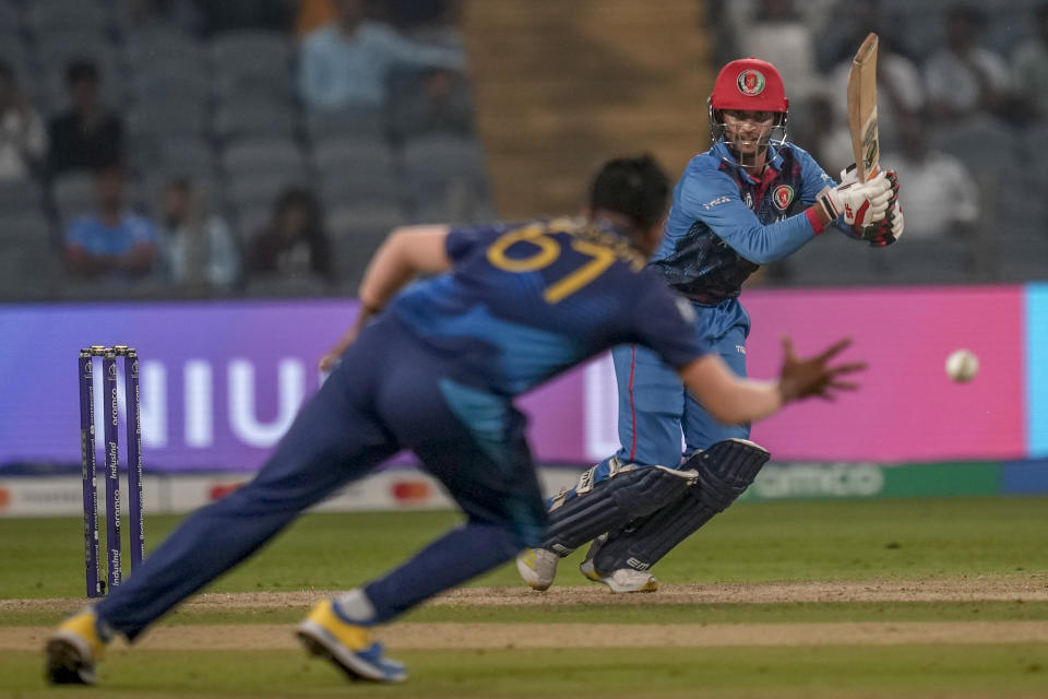 Afghanistan's Azmatullah Omarzai bats during the ICC Men's Cricket World Cup match between Sri Lanka and Afghanistan in Pune, India, Monday, Oct. 30, 2023. (AP Photo/Rajanish Kakade)