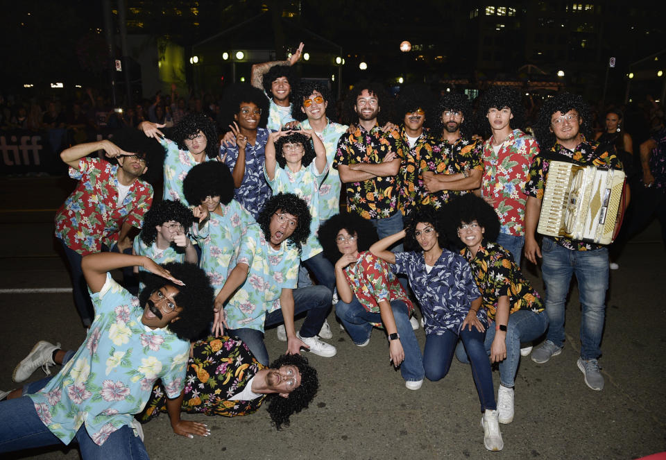 "Weird Al" impersonators attend the premiere for "Weird: The Al Yankovic Story" on Day 1 of the Toronto International Film Festival at Royal Alexandra Theatre on Thursday, Sept. 8, 2022, in Toronto. (Photo by Evan Agostini/Invision/AP)