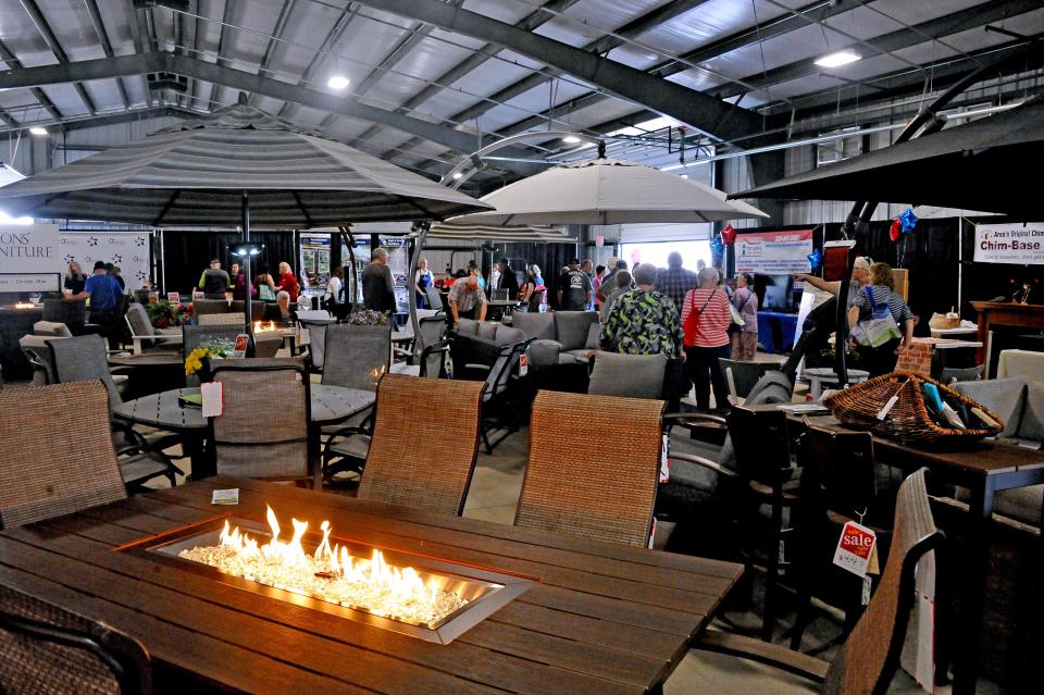 A large display patio furniture was on hand for people attending the Home and Garden show.