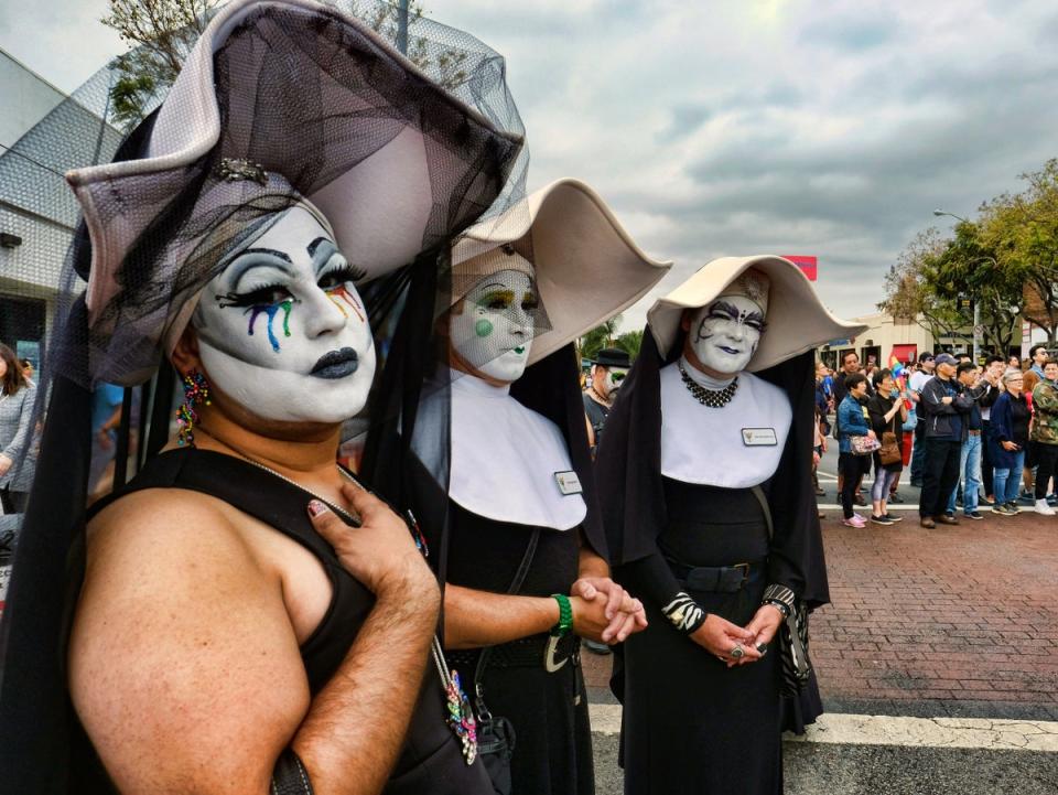 The LA chapter of the Sisters of Perpetual Indulgence attends a Pride parade in Hollywood on 12 Jun 2016 (AP Photo/Richard Vogel)