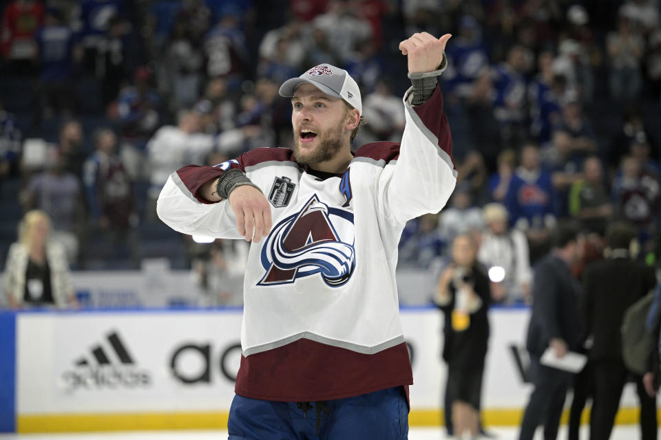 FILE - Colorado Avalanche right wing Mikko Rantanen (96) motions to fans in the stands after winning the Stanley Cup against the Tampa Bay Lightning in Game 6 of the NHL hockey Stanley Cup Finals on Sunday, June 26, 2022, in Tampa, Fla. Rantanen can’t believe just how quickly the summer went by. One moment they’re riding through the streets of Denver on firetrucks and the next they’re back on the ice. “But it was a good reason for a short summer,” the Colorado Avalanche forward cracked. (AP Photo/Phelan M. Ebenhack)