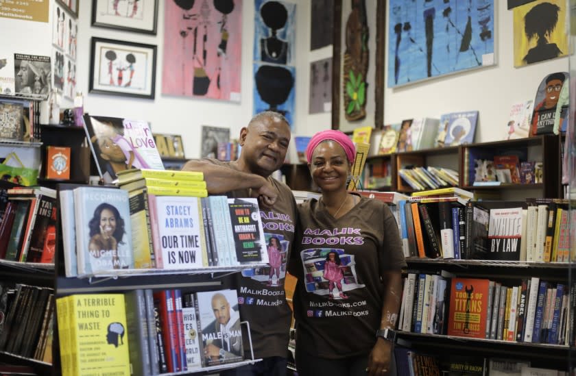 LOS ANGELES, CA - JULY 14: Malik and April Muhammad (cq) of Malik Books want to "change minds to bring change" through their bookstore in Los Angeles that celebrates the African American experience, culture and pride. (Myung J. Chun / Los Angeles Times)