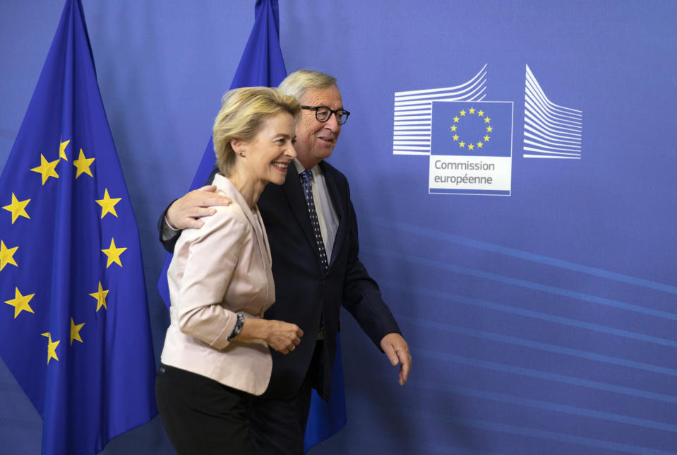 Germany's Ursula von der Leyen is welcomed by European Commission President Jean-Claude Juncker prior to a meeting at EU headquarters in Brussels, Thursday July 4, 2019. European Union leaders have nominated Germany's Ursula von der Leyen to become the next president of the European Commission. (AP Photo/Virginia Mayo)