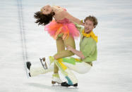 <p>Garden-inspired, complete with flower petal skirts, the French ice dancing team were one of the most colorful teams at the Sochi Games. Pechalat combined her pastel orange, pink and yellow dress with sheer green tights. </p>