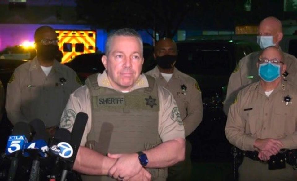 This Saturday, Sept. 12, 2020, still image taken from video released by the Los Angeles County Sheriff's Department, shows Los Angeles Sheriff Alex Villanueva taking questions at a late-night news conference about the condition of two Sheriff's deputies in Compton, Calif. Authorities searched Sunday for a gunman who shot and wounded two Los Angeles County sheriff's deputies who were sitting in their squad car, an apparent ambush that drew an angry response from the president and sparked an anti-police protest outside the hospital where the deputies were being treated. (Los Angeles County Sheriff's Department via AP)