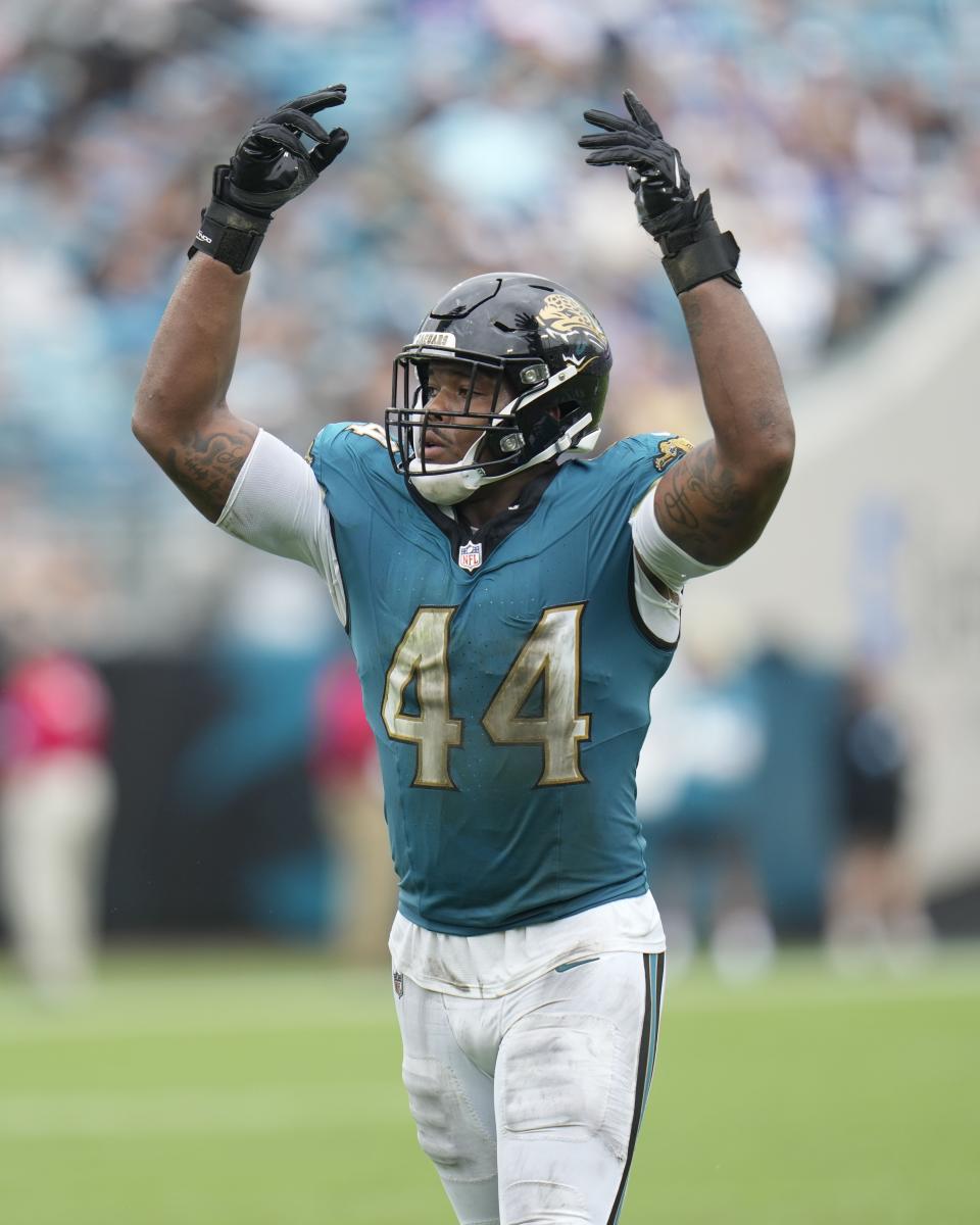 Jacksonville Jaguars' Travon Walker reacts during the second half of an NFL football game against the Indianapolis Colts, Sunday, Oct. 6, 2024, in Jacksonville, Fla. (AP Photo/John Raoux)