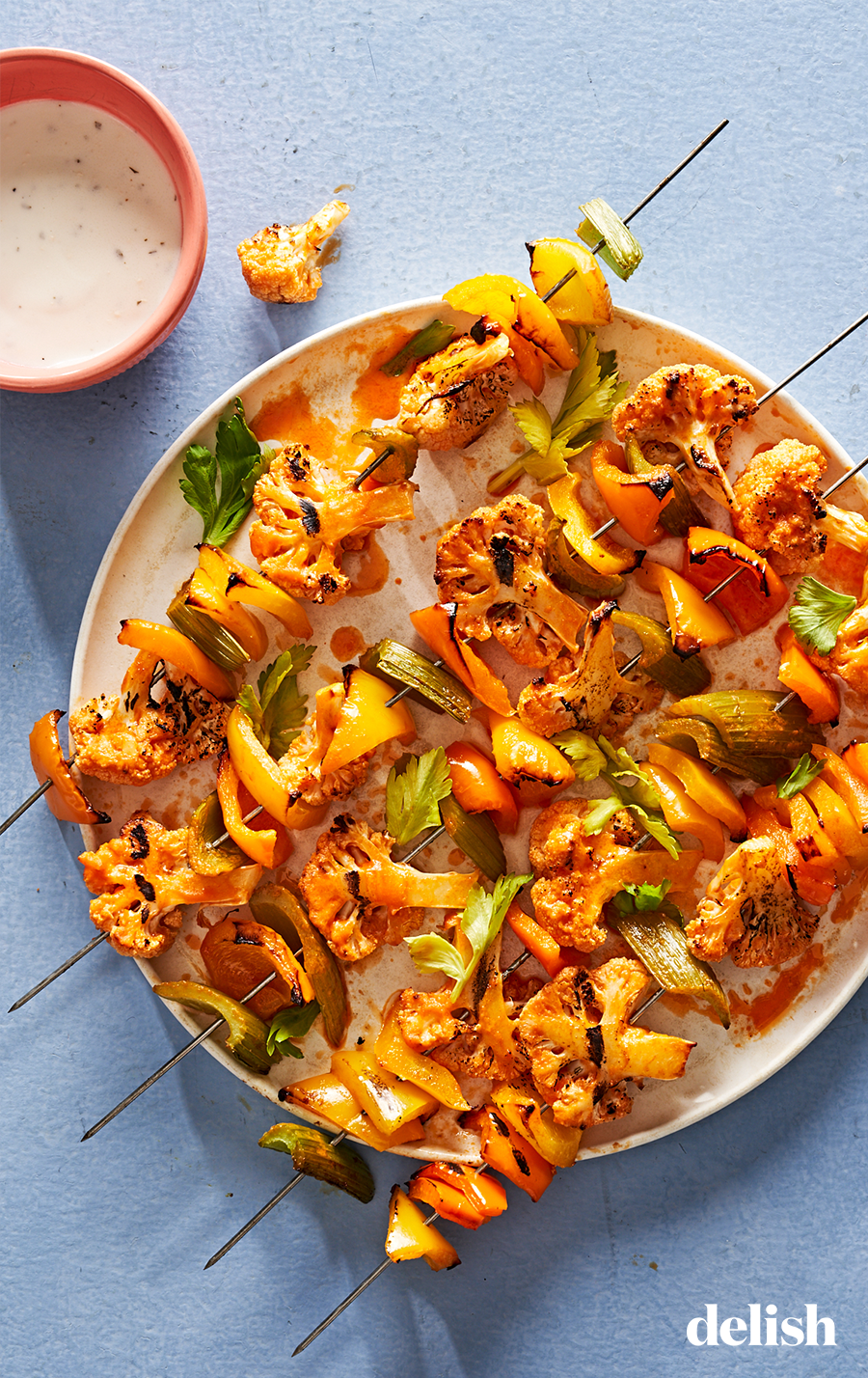 buffalo cauliflower kebabs with peppers and celery