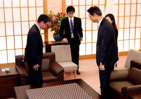 South Korean ambassador to Japan Lee Su-hoon (R) meets with Japanese Foreign Minister Taro Kono at the Foreign Ministry in Tokyo, Japan October 30, 2018. REUTERS/Issei Kato