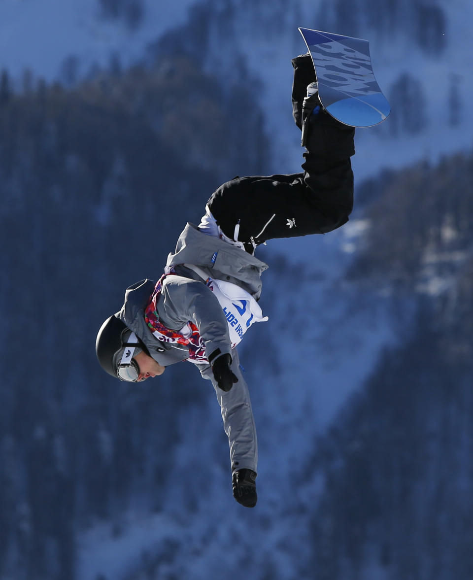 Austria's Mathias Weissenbacher takes a jump during men's snowboard slopestyle qualifying at the Rosa Khutor Extreme Park ahead of the 2014 Winter Olympics, Thursday, Feb. 6, 2014, in Krasnaya Polyana, Russia. (AP Photo/Sergei Grits)