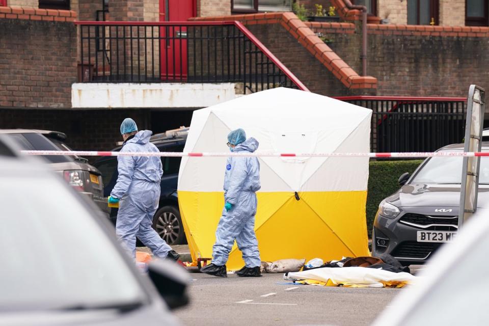 Police forensic officers at the scene near Bywater Place in Surrey Quays (PA) (PA Wire)