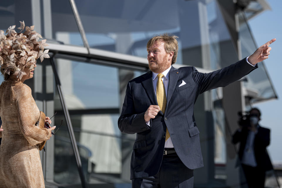 King Willem-Alexander of the Netherlands and Queen Maxima visit the roof terrace of the Reichstag building of the German Bundestag in Berlin, Germany, Tuesday, July 6, 2021. The Dutch royal couple is in Berlin for a three-day state visit. (Fabian Sommer/dpa via AP)