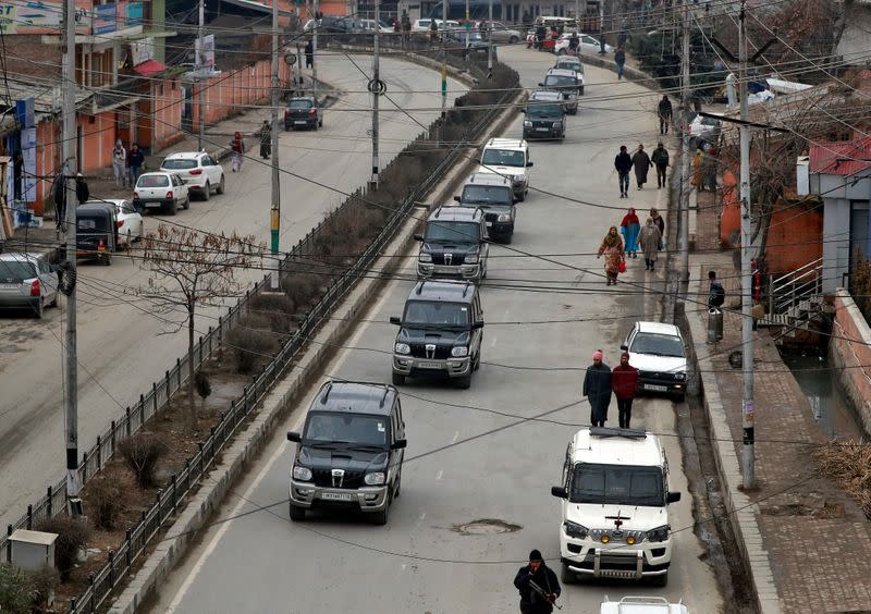 A convoy believed believed to be transferring foreign diplomats is seen in Srinagar