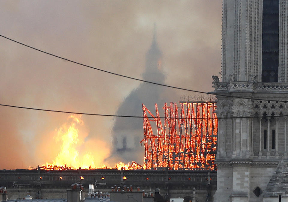 Flames rise from Notre Dame cathedral as it burns in Paris, Monday, April 15, 2019. (Photo: Thibault Camus/AP)