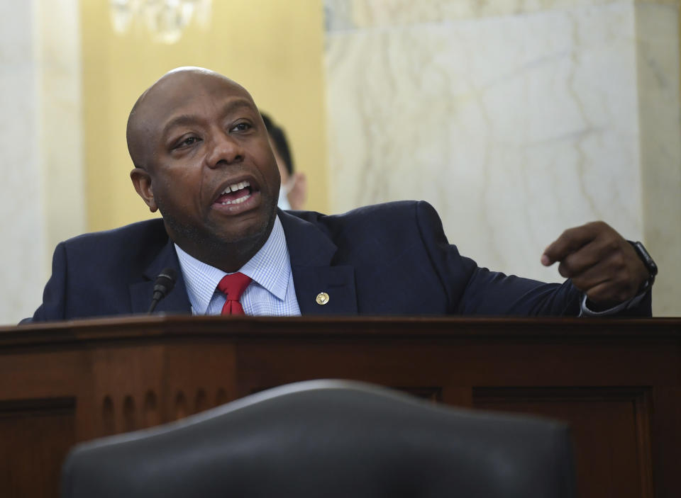FILE - In this June 10, 2020, file photo, Sen. Tim Scott, R-S.C., speaks during a Senate Small Business and Entrepreneurship hearing to examine implementation of Title I of the CARES Act, on Capitol Hill in Washington. Initially reluctant to speak on race, Scott is now among the Republican Party’s most prominent voices teaching his colleagues what it’s like to be a Black man in America.(Kevin Dietsch/Pool via AP)