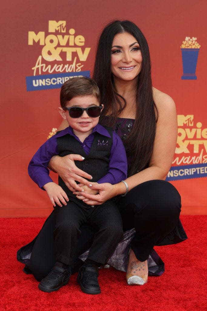 Christopher John Buckner and his mom Deena Nicole Cortese attend the 2022 MTV Movie & TV Awards in Santa Monica, California.