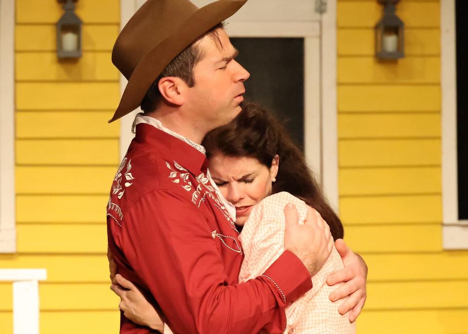 Ryan Van Buskirk and Jen Almeida provide each other with comfort in "Oklahoma" at the Academy of Performing Arts in Orleans.