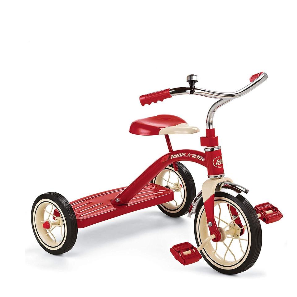 <p><strong>Radio Flyer</strong></p><p>amazon.com</p><p><strong>$59.99</strong></p><p><a href="https://www.amazon.com/dp/B00BPKPCGG?tag=syn-yahoo-20&ascsubtag=%5Bartid%7C10055.g.4695%5Bsrc%7Cyahoo-us" rel="nofollow noopener" target="_blank" data-ylk="slk:Shop Now;elm:context_link;itc:0;sec:content-canvas" class="link ">Shop Now</a></p><p>If she insists she's ready to hit the road, this tricycle is durably made from steel construction and rubber tires. The rear step makes it easy to step on and off and<strong> the adjustable seat grows as she does</strong>. </p>