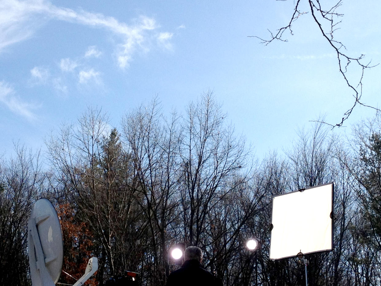 A view of CNN reporter Wolf Blitzer from behind as he reports from Newtown, Conn.