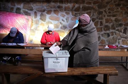 A man casts his vote during the national elections at Semonkong, Lesotho June 3, 2017. REUTERS/Siphiwe Sibeko