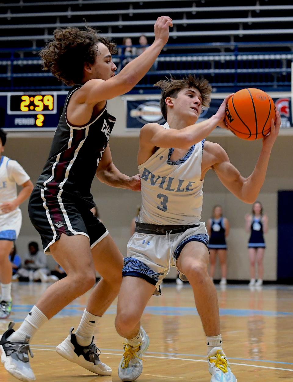 Bartlesville High School's Nash Zervas (3) tries to control the ball in basketball action against Edmond Memorial in Bartlesville on Dec. 19, 2023.