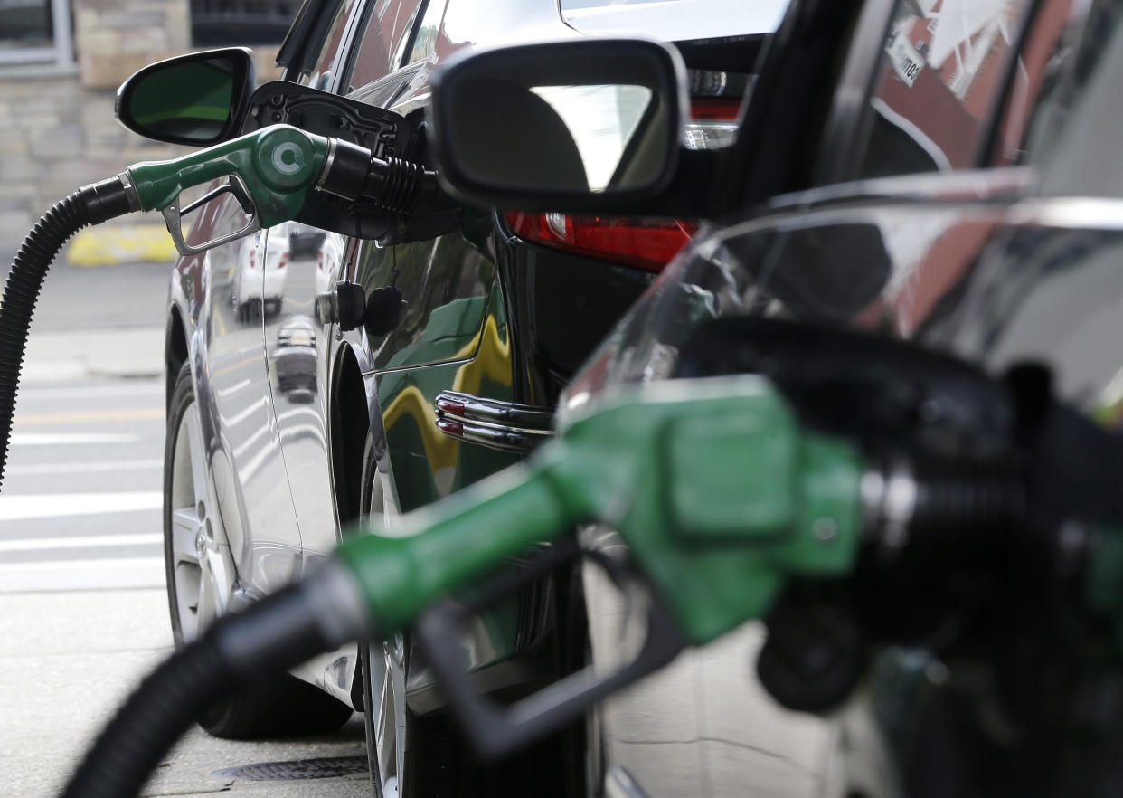 car  FILE - In this June 30, 2016 file photo, nozzles pump gas into vehicles at a BP gas station in Hoboken, N.J. A week after New Jersey's gas tax goes up by 23 cents a gallon thanks to a new law, voters will weigh in on whether every cent of the tax should to exclusively to transportation (AP Photo/Julio Cortez)