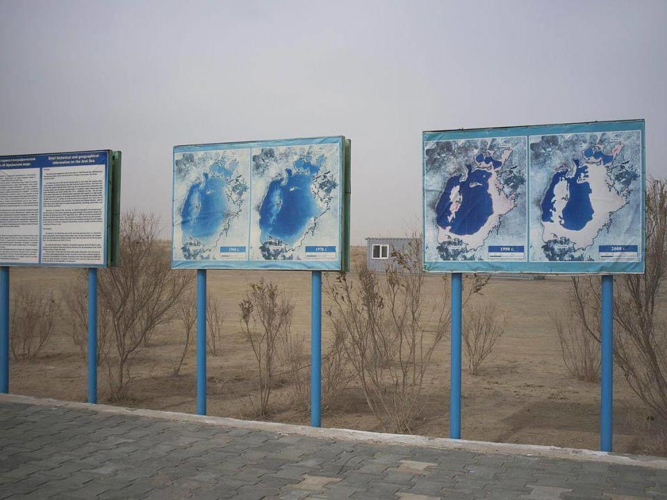 Signs in Muynak show the disappearance of the once vast body of water (Aleksandr Zykov)